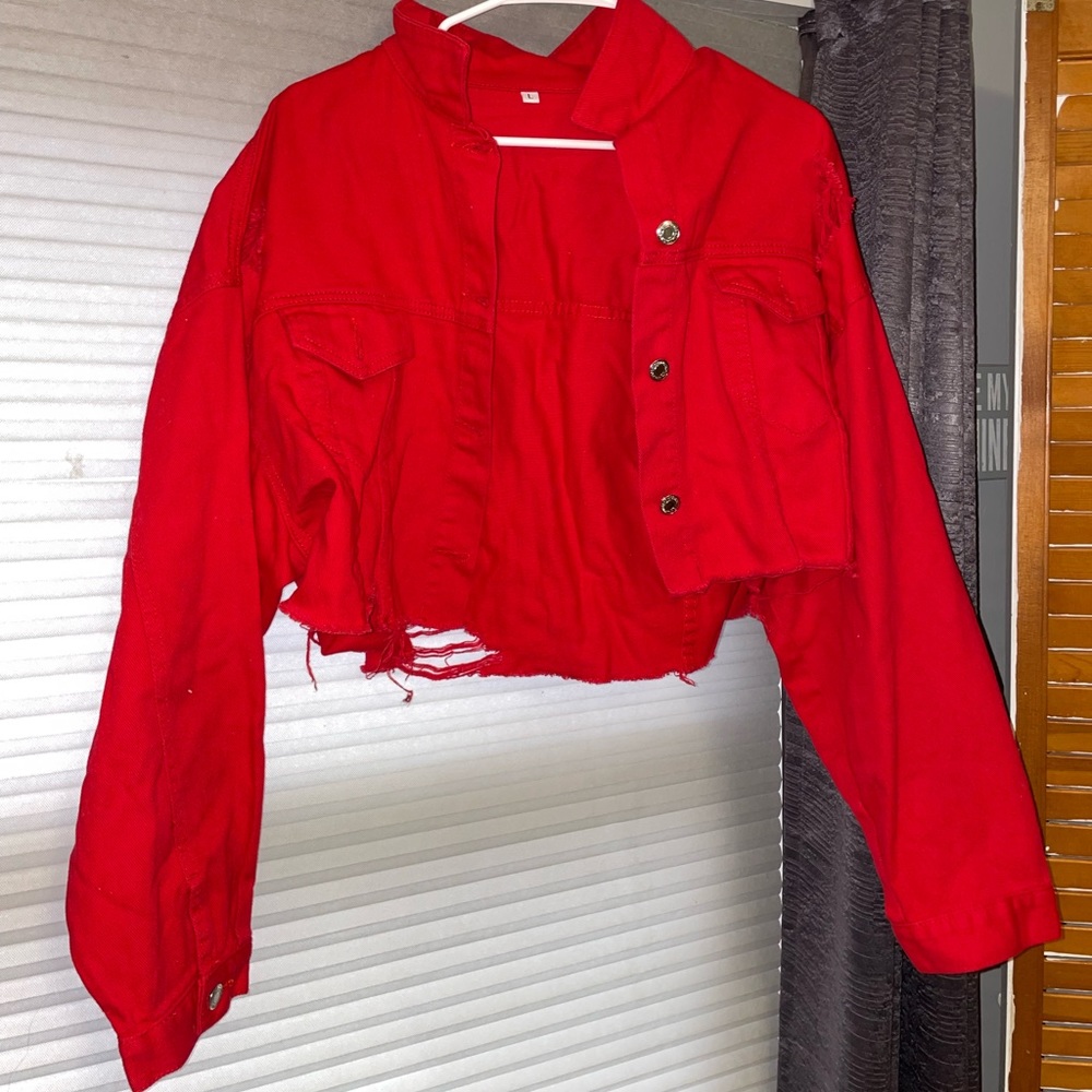 Red jean jacket with rips